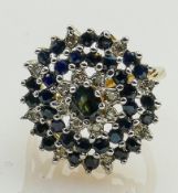 Ladies 9ct gold dress ring: Set with diamonds & sapphires, 5.2g, size O/P.