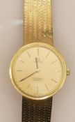 9ct gold OMEGA Constellation gents quartz watch with 9ct gold bracelet: Gross weight 62.4g, not in