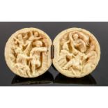 18/19th century Dieppe carved Ivory Diptych with religious scene in clam shell form: Diameter 5cm.