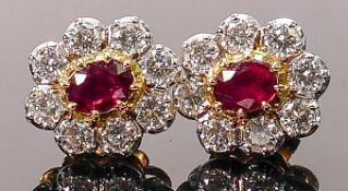 18ct gold earrings set ruby & diamonds: Nice colour ruby set with 8 bright diamonds, each