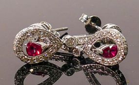 18ct white gold earrings set with diamond & rubies: Each earing set with a good colour ruby and 29