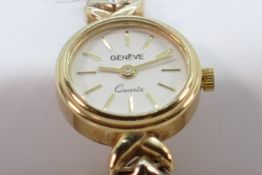 9ct gold Geneve ladies wristwatch: With 9ct gold bracelet, 16.9g.