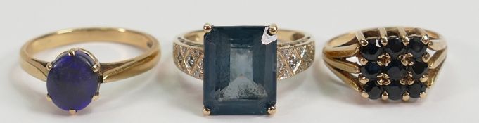 A collection of 9ct ladies dress rings: Comprising 9ct ring set with large rectangular blue stone