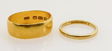 Two x 22ct gold hallmarked wedding rings or bands: Gross weight 9.2g, one misshapen.