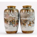 Pair of early 20th century Japanese Kutani vases: Winter battle scenes, height 12.5cm. (2)