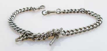 Hallmarked silver heavy double Albert watch chain: Gross weight 63.2g. One clip replaced and not