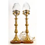 Pair of converted brass candlesticks with cut glass tear drop shades: Height including shade 53cm.