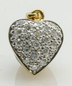 Ladies 9ct gold heart shaped pendant: Set with diamonds, 3g.