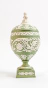 Wedgwood sage green lidded vase: Classically decorated with squared foot & cherub to lid, height