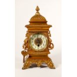 Victorian ornate brass bracket clock: Height 35cm.