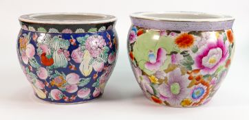 Two 20th century Chinese porcelain planters: Each decorated with flowers and goldfish to the