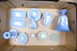 A collection of Wedgwood Jasperware including: vases, lidded boxes, pin dishes, small Lilac lidded