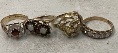 Four 9ct gold rings: total weight 10g.