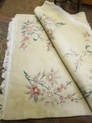 Large cream/floral rug: approx 2.6m x 1.55m.