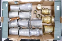 A collection of Brass & Pewter Tankards: