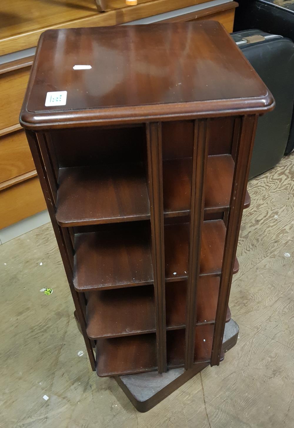 Mahogany revolving bookcase: 35cm W x 35cm D x 76cm H.