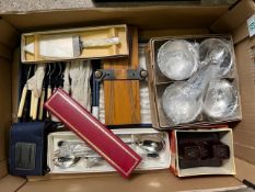A mixed collection of items to include: Boxed Cutlery sets, Bakelite View Finder, Boxed Meat Skewer,