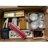 A mixed collection of items to include: Boxed Cutlery sets, Bakelite View Finder, Boxed Meat Skewer,