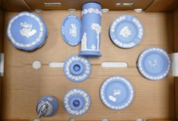 A collection of Wedgwood Blue Japserware to include: lidded pots, candlesticks, pin dishes etc