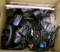 A collection of walkie talkie type equipment: Cobra branded items, chargers etc.