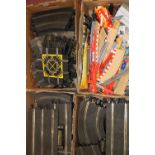 A large quantity of Scalextric track and accessories: (4 trays).