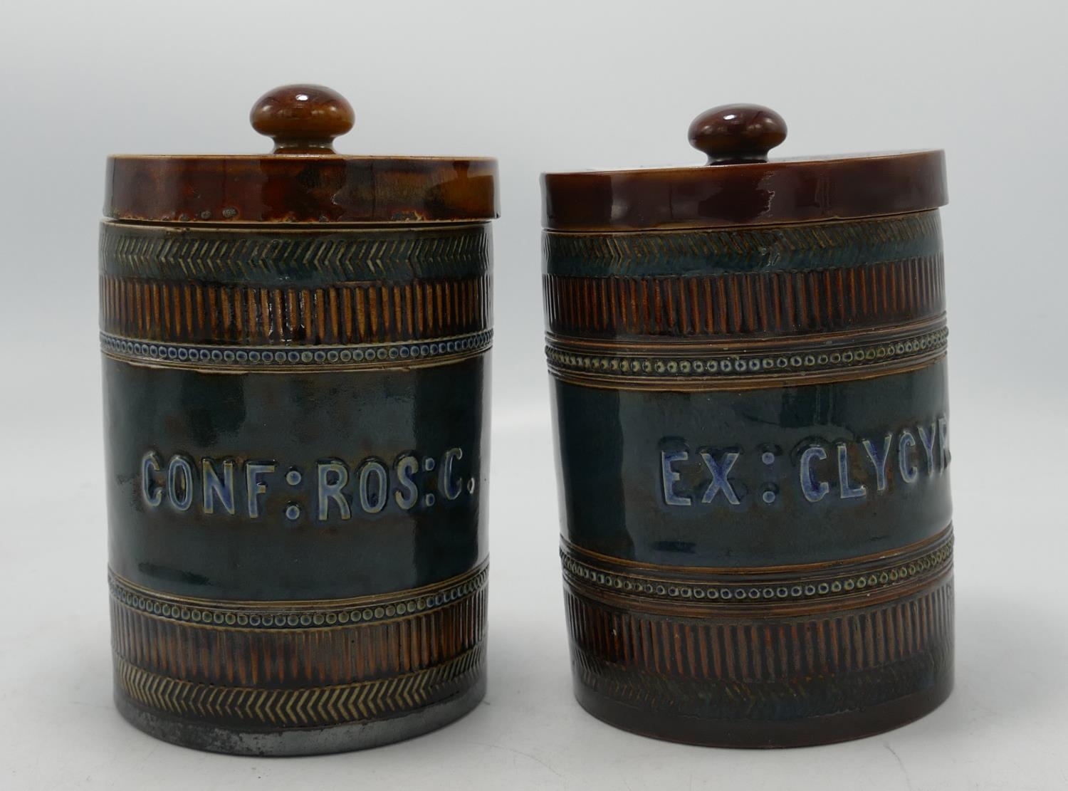 Two Doulton Lambeth Pharmaceutical jars: height 12.5cm(2)