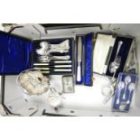 A collection of silver plated items including: cased cutlery sets, cream jug handled basket etc