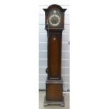 Oak cased grandmother clock with brass dial: Standing 166cm high approx. Three train movement.