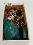 Shoe box containing a variety of costume jewellery: Includes beads, necklaces, pendants, bangles,