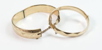 2 x 9ct gold bangles each with metal core: Both heavy items, gross weight 68 grams. One stamped