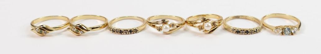 7 x gold plated dress rings of nice quality with claw set stones.