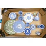 A collection of Wedgwood multi coloured jasperware to include: sage green plates, lidded box,