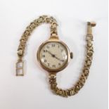 9ct gold watch and 9ct bracelet: Gross weight 25.2g. Winds, ticks & runs.