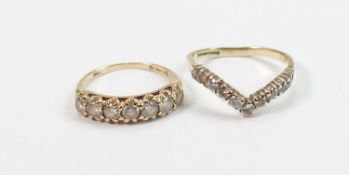 Two x 9ct gold and white stone dress rings: Gross weight 3.3g. Sizes J & L (wishbone). One stone