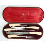 Five piece carving set cased with silver mounts: Hallmarked silver mounts and cappings, bone