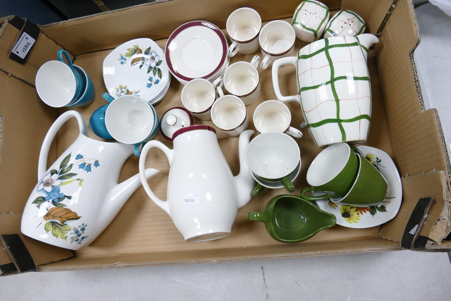 A collection of Midwinter pottery to include: cups, saucers coffee pots, milk jugs etc