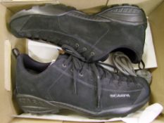 A boxed pair of Scarpa black trainers: size 10.
