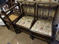 Four Early 20th Century oak dining chairs: with upholstered seats
