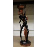 A very large African hardwood hand carved figure of tribal man and lady: 55cm in height.
