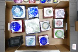 A collection of boxed Royal Crest & The House of Valentina Glass Paperweight