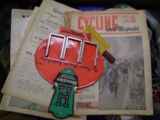 A collection of vintage cycling items: to include clothing and advertising items