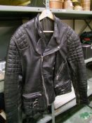 1970's leather biker jacket: with two enamel badges of local interest