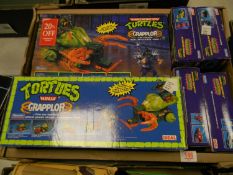 A collection of Ideal Branded Teenage Mutant Turtles Boxed items including Grapplor & Road Ready