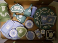 A good collection of Wedgwood Jasperware items to include: teal vases and plate, black, sage green