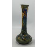 Moorcroft bud vase in the Peacock pattern: Measures 20.5cm high.