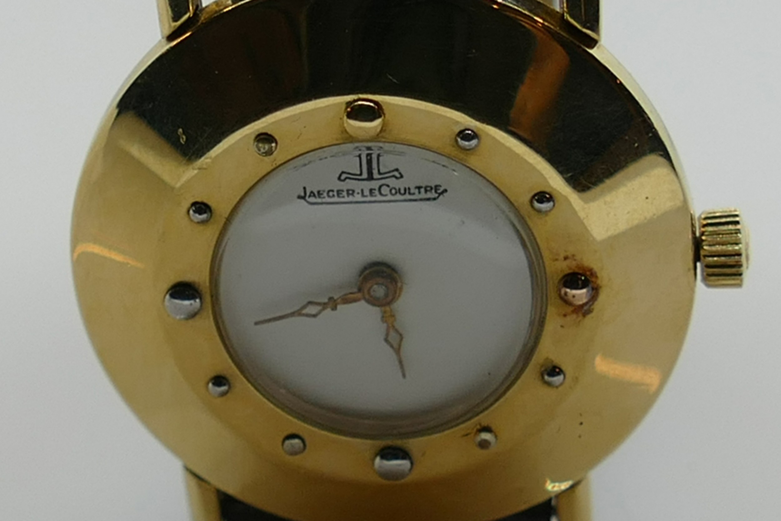 Jaeger le Coultre 14ct gold vintage wristwatch: Gents/ladies dial diameter 3cm with leather strap.