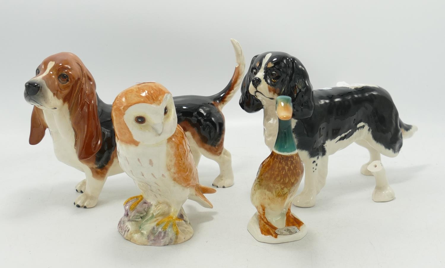 Beswick Items to include: damaged King Charles Spaniel, damaged Bassett Hound, Owl & duck(4)