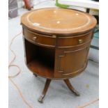Edwardian Mahogany leather topped swivel drum table: with claw feet castors. 51cm diameter x 67cm