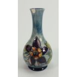 Moorcroft Columbine on light blue ground small vase: chip to upper rim , height 16cm