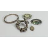A collection of vintage silver brooches and bangles, 40g: